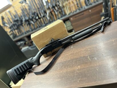 Strzelba Mossberg 500, kal. 12/76 - używana z kolimatorem